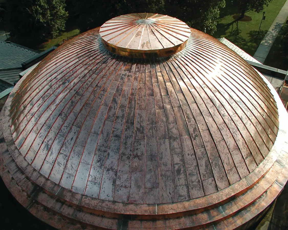 Craftsman Roofing crew installing a new roof in Clicquot